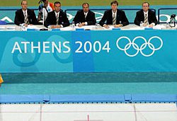 ATHENS - AUGUST 20:  Karen Cockburn of Canada competes in the women's trampoline qualifier on August 20, 2004 during the Athens 2004 Summer Olympic Games at the Olympic Sports Complex Indoor Hall in Athens, Greece.  Cockburn placed second and won the silver medal in the finals.  (Photo by Jamie Squire/Getty Images) *** Local Caption *** Karen Cockburn